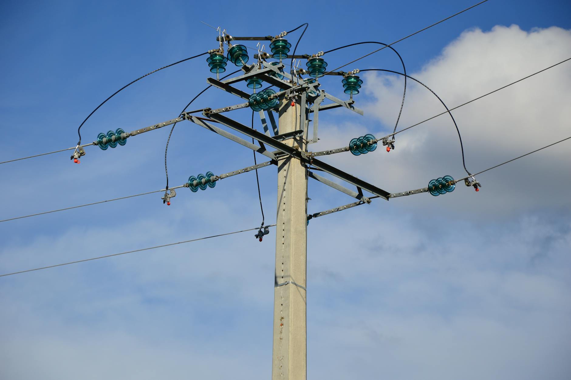 Complex electrical grid system with high voltage transmission towers and substations