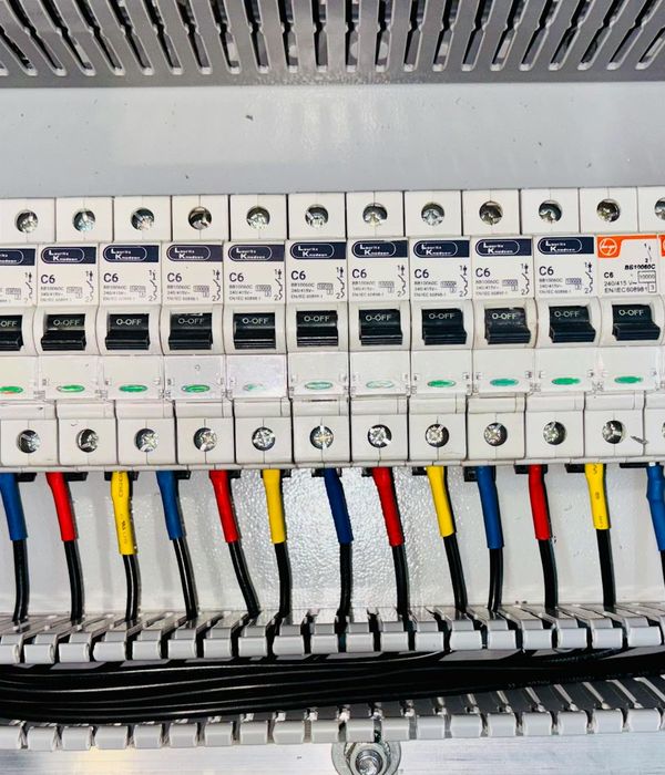 Modern industrial electrical distribution center with circuit breakers and control systems